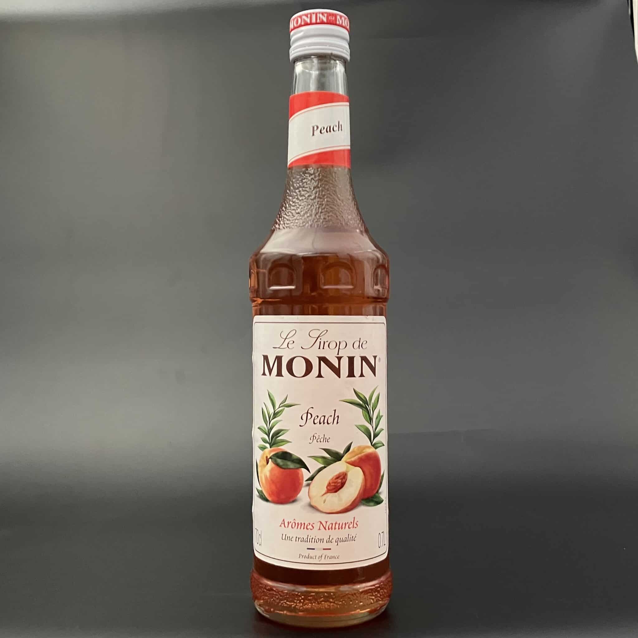 monin peach sirup. 70cl.